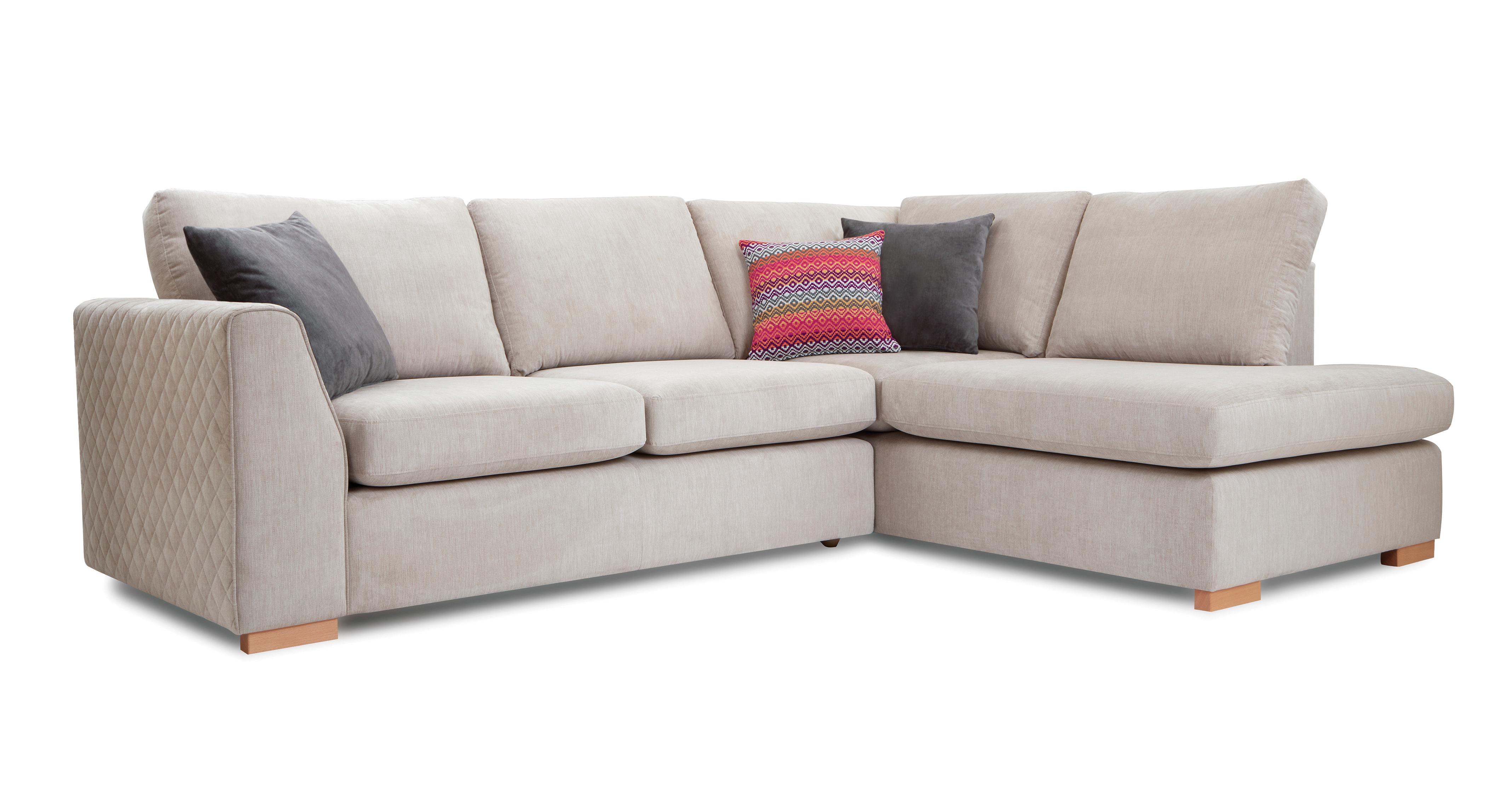 Beige off white corner sofa with gray pillows