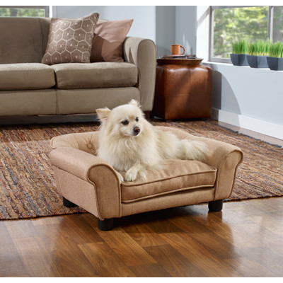 Beige plush dog sofa