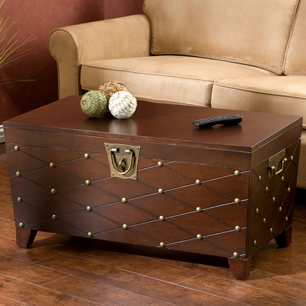 Nailhead embellished espresso colored cocktail table-cum-chest