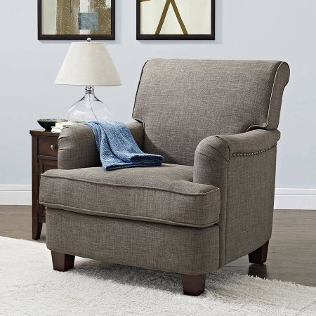 Rolled top grey club chair with nailheads and soft fabric upholstery 
