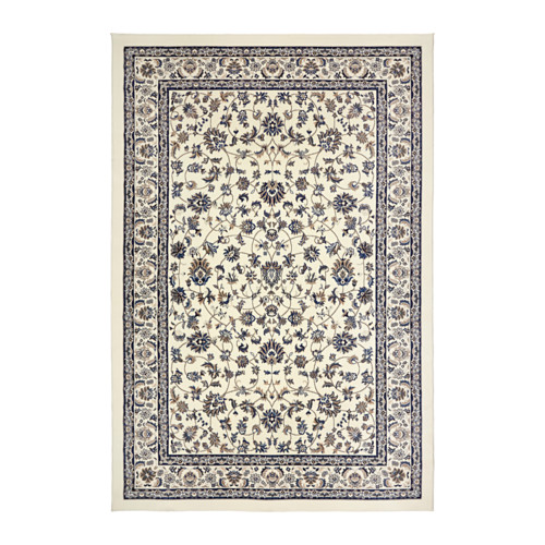 Paisley teal rug with Indian motifs