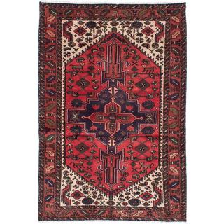 Deep crimson hand knotted Afghan rug